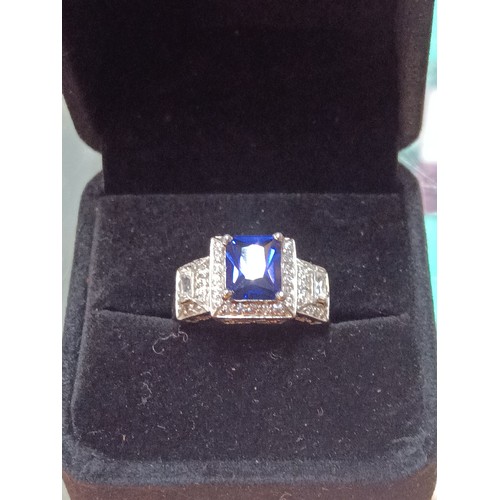 43B - A Substantial .925 Silver Dress Ring with Central Blue Stone