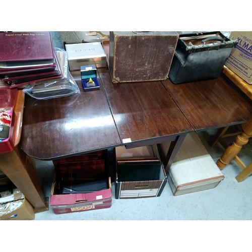 604 - A Pembroke Style Gate Legged  Drop Leaf Table in Mahogany with Rule Joint in Top and leaves. 132 x 9... 