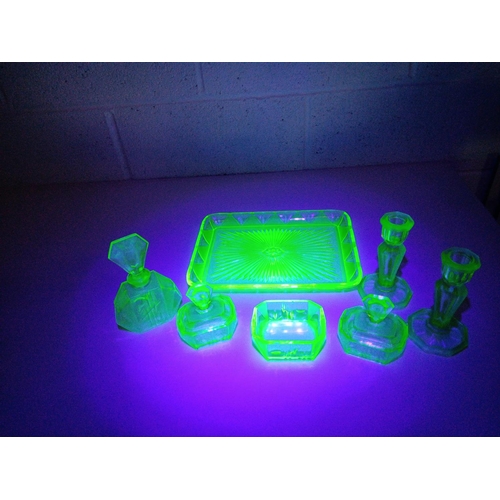 330 - A Uranium Glass Dressing Table Set