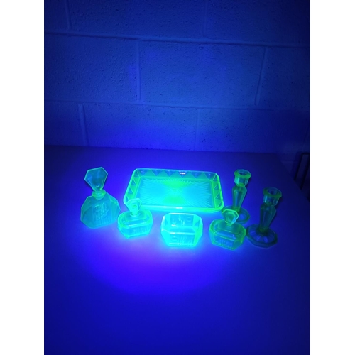 330 - A Uranium Glass Dressing Table Set