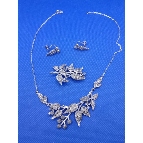 304 - A Silver and Marquisite Necklace , Broach and Earring Set