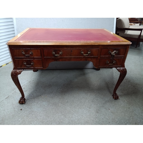 296B - A Red Leather Topped Desk with Claw and Ball Feet with Keys 122 x 76 x 77cm