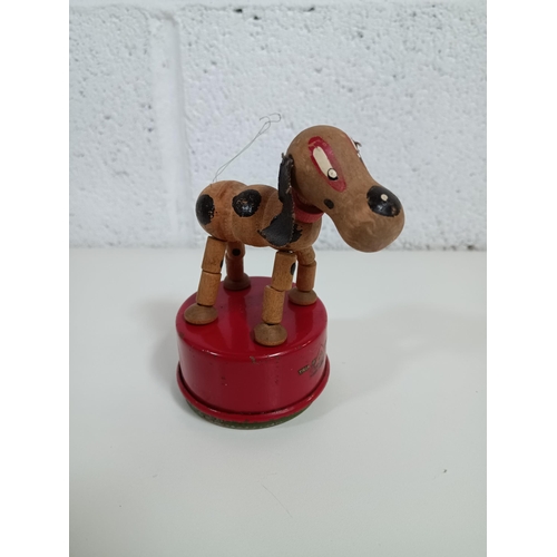 861 - A 1950's Triang Wakouwa Toy Dog - missing tail & stick