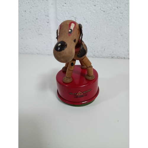 861 - A 1950's Triang Wakouwa Toy Dog - missing tail & stick