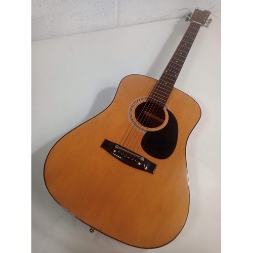 886 - An Angelica Accoustic Guitar