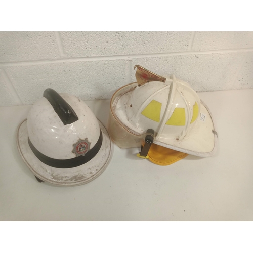 796 - A Devon Fire Service and American Fire Fighting Helmets