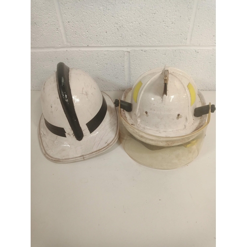 796 - A Devon Fire Service and American Fire Fighting Helmets