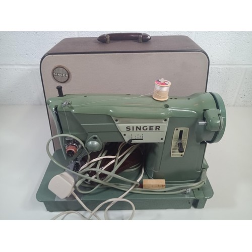 840 - A Vintage Electric Singer Sewing Machine