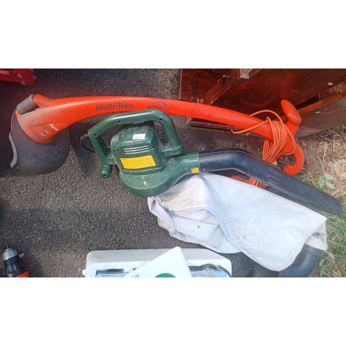 57 - Flymo Electric Revolution Strimmer and a Black and Decker Leaf Blower