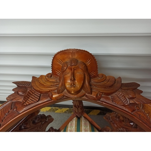 82 - Heavily Carved Corner Chair with Angel Motif