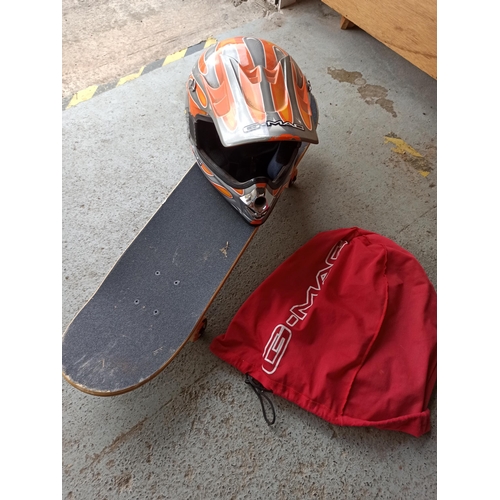 767 - Skateboard and Crash Helmet