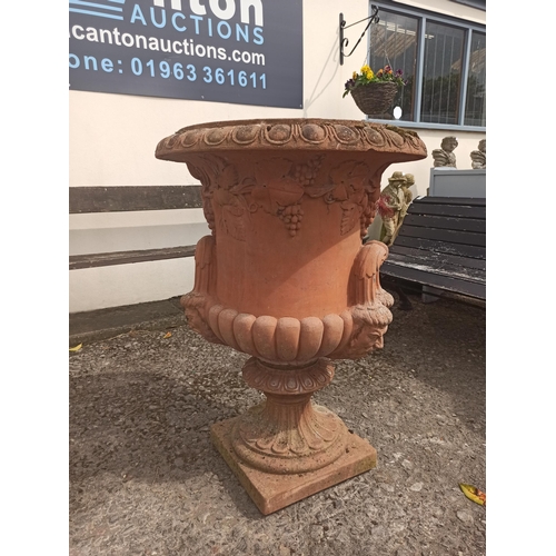 1 - Large Terracota Coloured Garden Urn/Planter depiciting grapes and heads