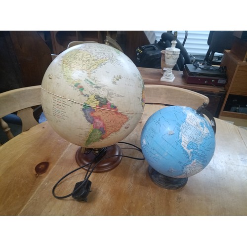 724b - A Light Up Globe and Another