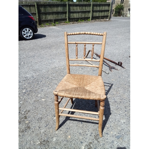 337 - A Cane Seated Elm Chair