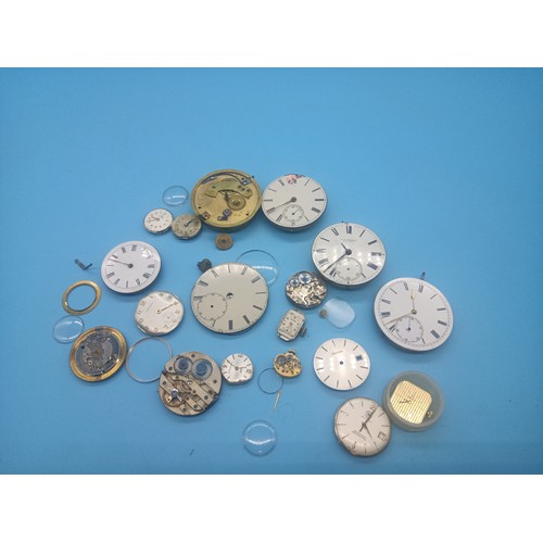 323 - A Quantity of Pocket Watch Parts and Faces inc. Omega, Bulova etc.