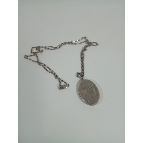 361 - A Heavy Silver Locket and Chain