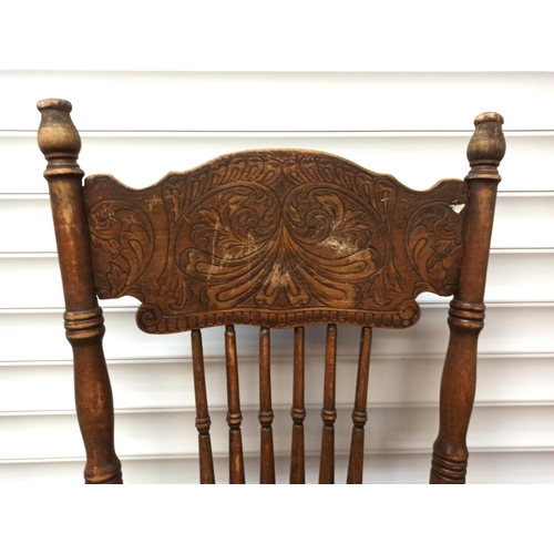 343 - An Antique Carved Hall Chair (requires attention)