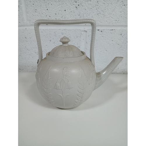 281 - An Antique Bisque Tea Pot with Staple Repair to Handle