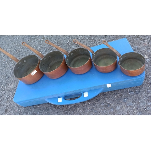 97 - A Collection of Vintage Graduated Copper Pans