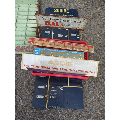 139B - A Selection of Metal Shop Display Stands inc.  Wells, Bees Seeds, Squires, Izal and Addis