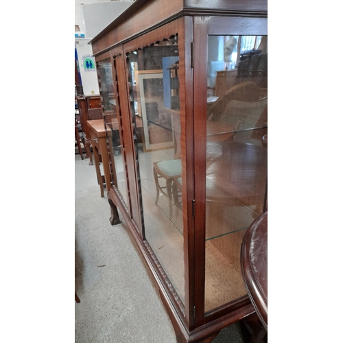 7 - An Edwardian Mahogany Display Cabinet with 2 Shelves and Key approx. 134 Length, 38cm Deep and 138cm... 