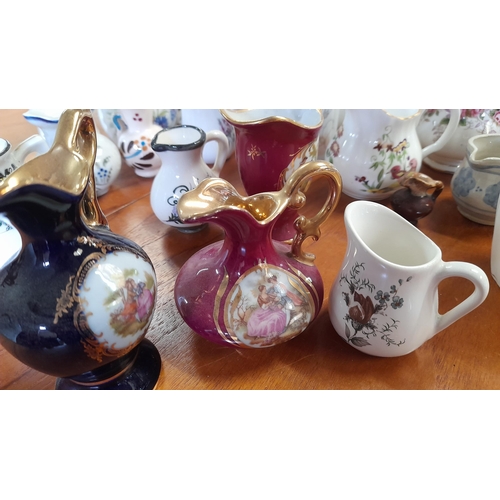 151 - A Selection of Miniature Collectable Jugs inc. Wedgewood, Limoge etc.