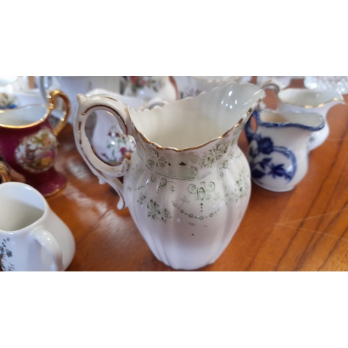 151 - A Selection of Miniature Collectable Jugs inc. Wedgewood, Limoge etc.