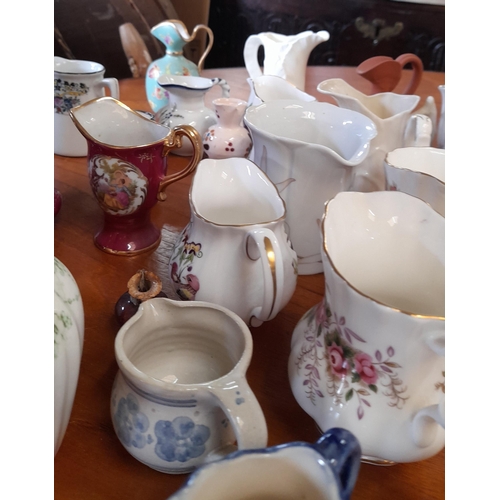 151 - A Selection of Miniature Collectable Jugs inc. Wedgewood, Limoge etc.