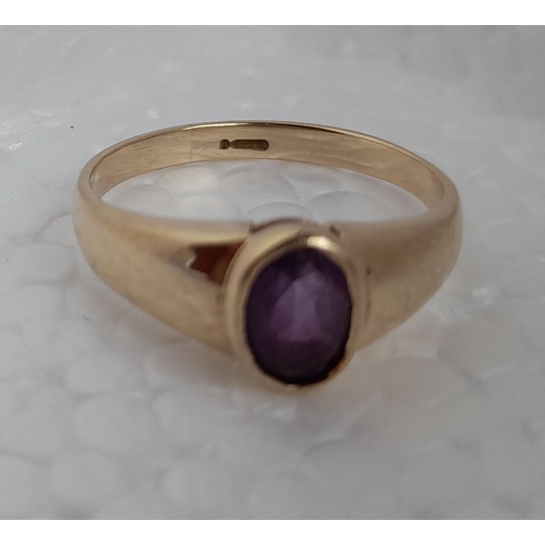 214 - Hallmarked 18ct Gold Amethyst Ring