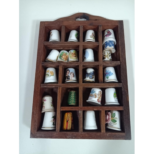 1038 - A Collection of Thimbles in Wall Display