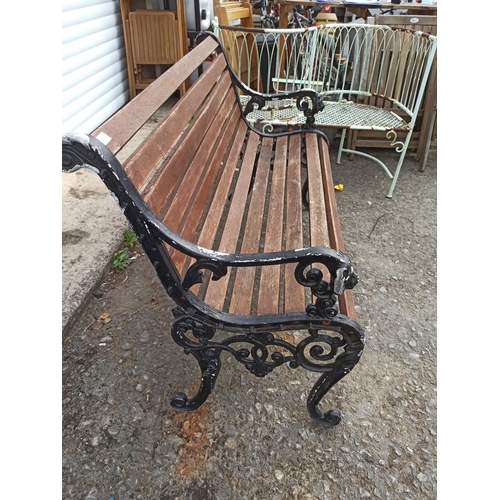 225 - A Garden Bench with Metal Lion Motif Ends