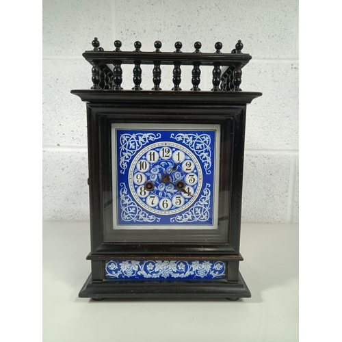 417 - An Arts and Crafts Period Mantle Clock with Ebonised Case and Blue and White Porcelain Panelled Base... 