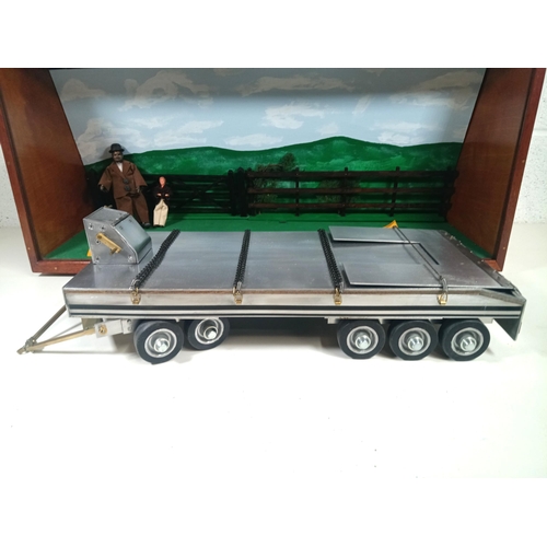 1117 - A Metal Model 10 Wheel Low Loader in Display Case with R.C Model Liebherr Dicke Toy Digger