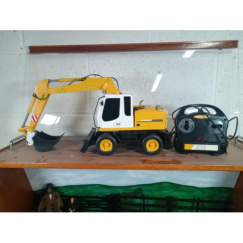 1117 - A Metal Model 10 Wheel Low Loader in Display Case with R.C Model Liebherr Dicke Toy Digger