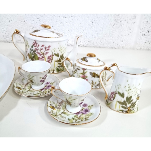 539 - A Regal Miniature Dolls Tea Service and Other cups and Saucers