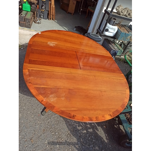 988 - A Beresford and Hicks Extending Vintage Table with Ornate Metal Feet