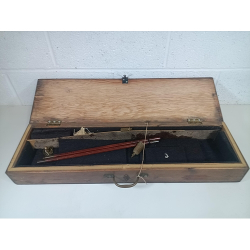 337 - A Wooden Gun Cleaning Case and Rod