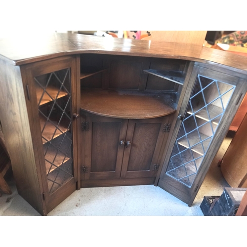 428 - Dark Wood Highly Carved Corner Bar Unit with Leaded Glass Curved Sides and Cupboard with Upper Shelf... 