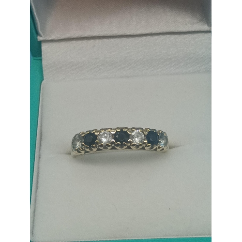 452 - A 9ct Gold Diamond and Sapphire Ring