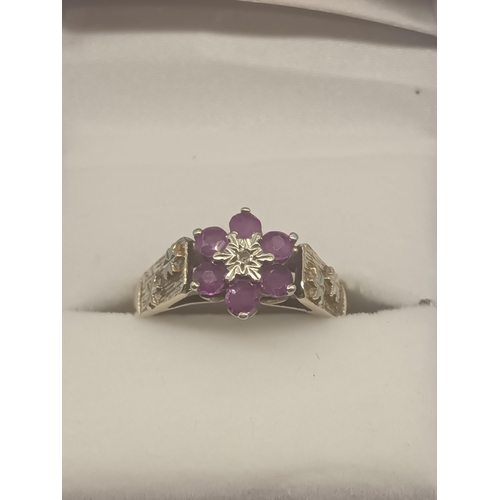 453 - A 9ct Gold Amethyst and Diamond Ring