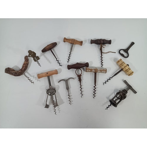 411 - A Collection of Antique Corkscrews including 