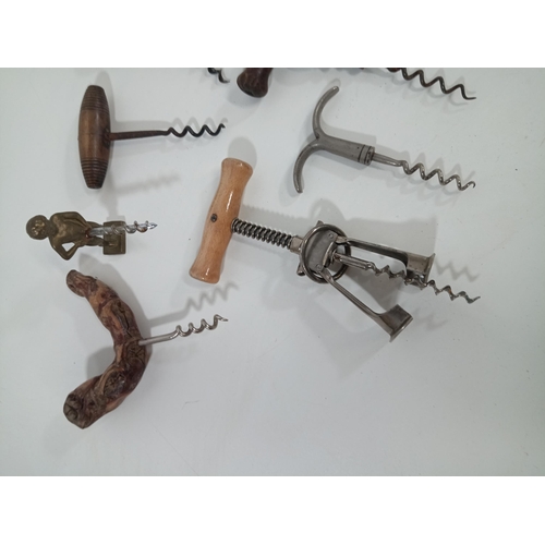 411 - A Collection of Antique Corkscrews including 