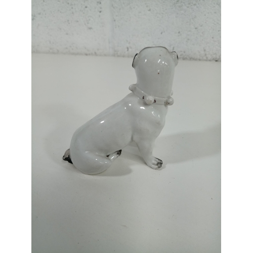 519 - A Victorian Porcelain Pug Dog Ornament ( missing part of tail)