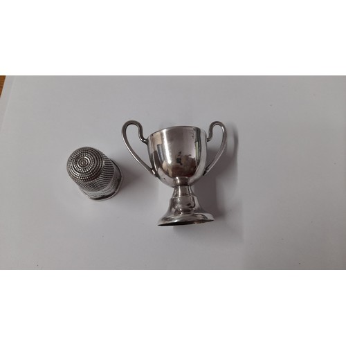 492 - A Silver Thimble and Trophy