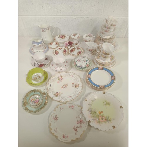 872 - A Qty of bone china part tea services including Royal Albert Country Roses, Royal Albert, Colclough ... 