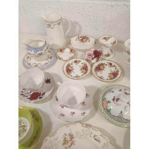 872 - A Qty of bone china part tea services including Royal Albert Country Roses, Royal Albert, Colclough ... 