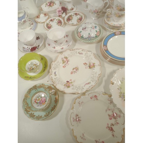 872 - A Qty of bone china part tea services including Royal Albert Country Roses, Royal Albert, Colclough ... 