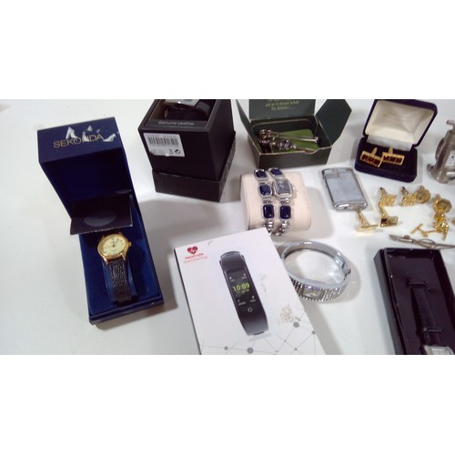 876 - An assortment of watches, cufflinks and oddments