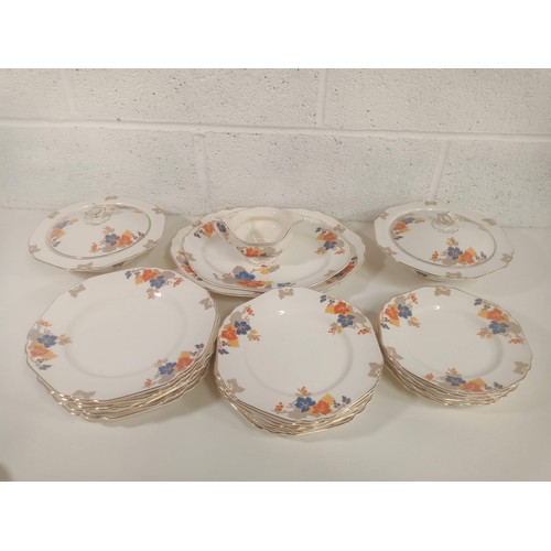 930e - A qty of Scotch Ivory Dinner Service