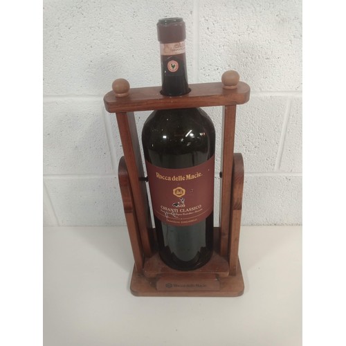 1039b - A Large Wine Bottle in Wooden Pourer 60cm High